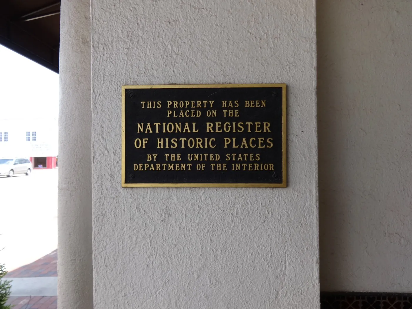 National Register of Historic Places plaque on the Rawls Hotel in downtown Enterprise