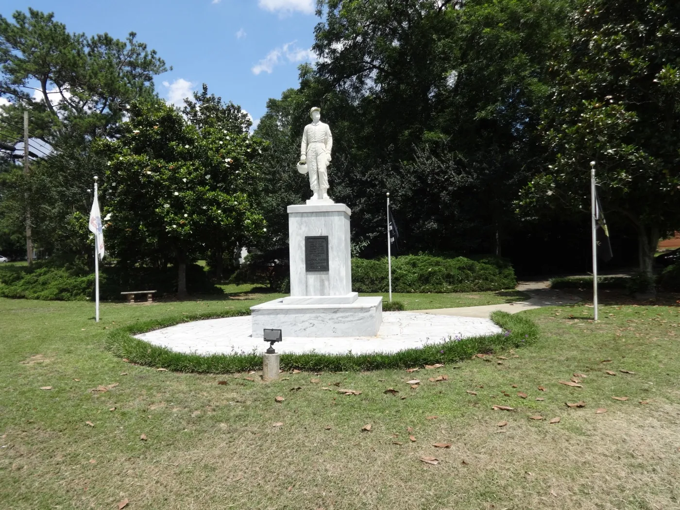 Aviation memorial statue and flagpoles in Enterprise